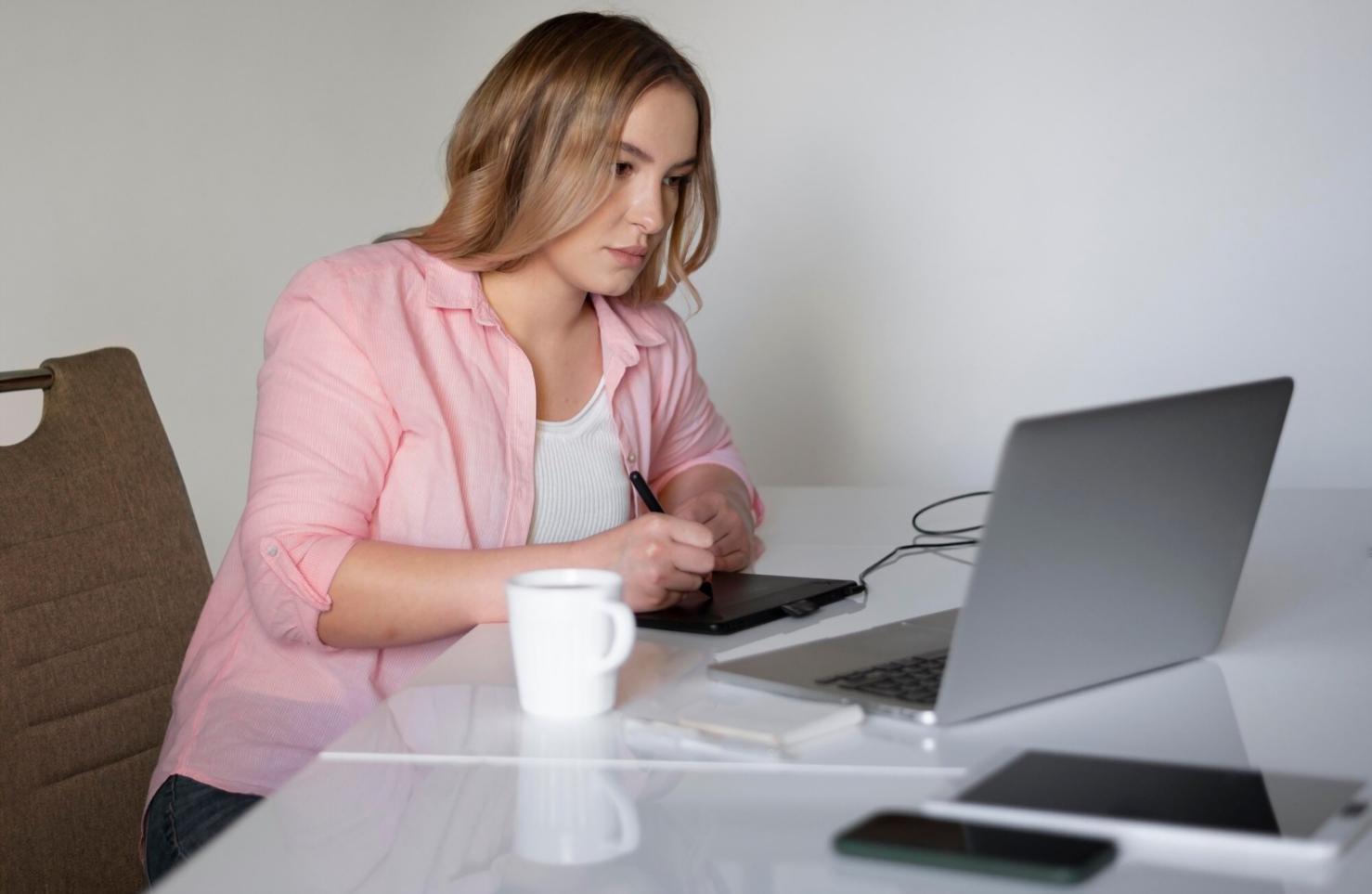 Professional analyzing financial charts and business metrics on computer screen